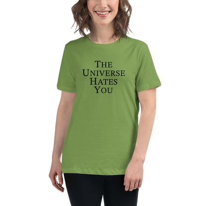 "The Universe Hates You" printed on a leaf women's relaxed t-shirt worn by a female