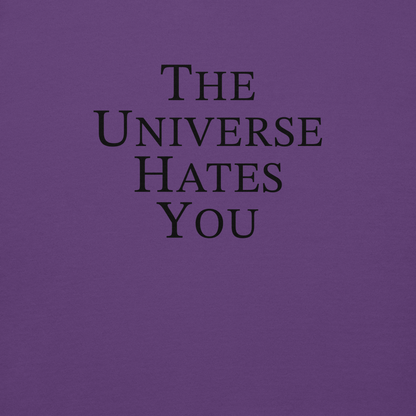 "The Universe Hates You" printed on a purple background