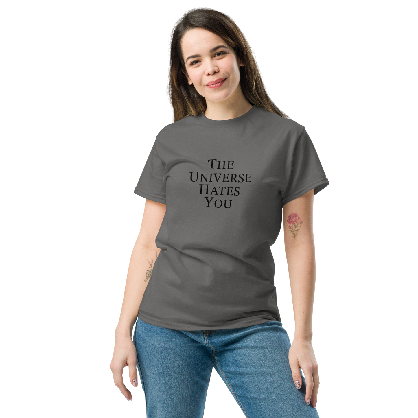 "The Universe Hates You" printed on a charcoal unisex classic tee worn by a female