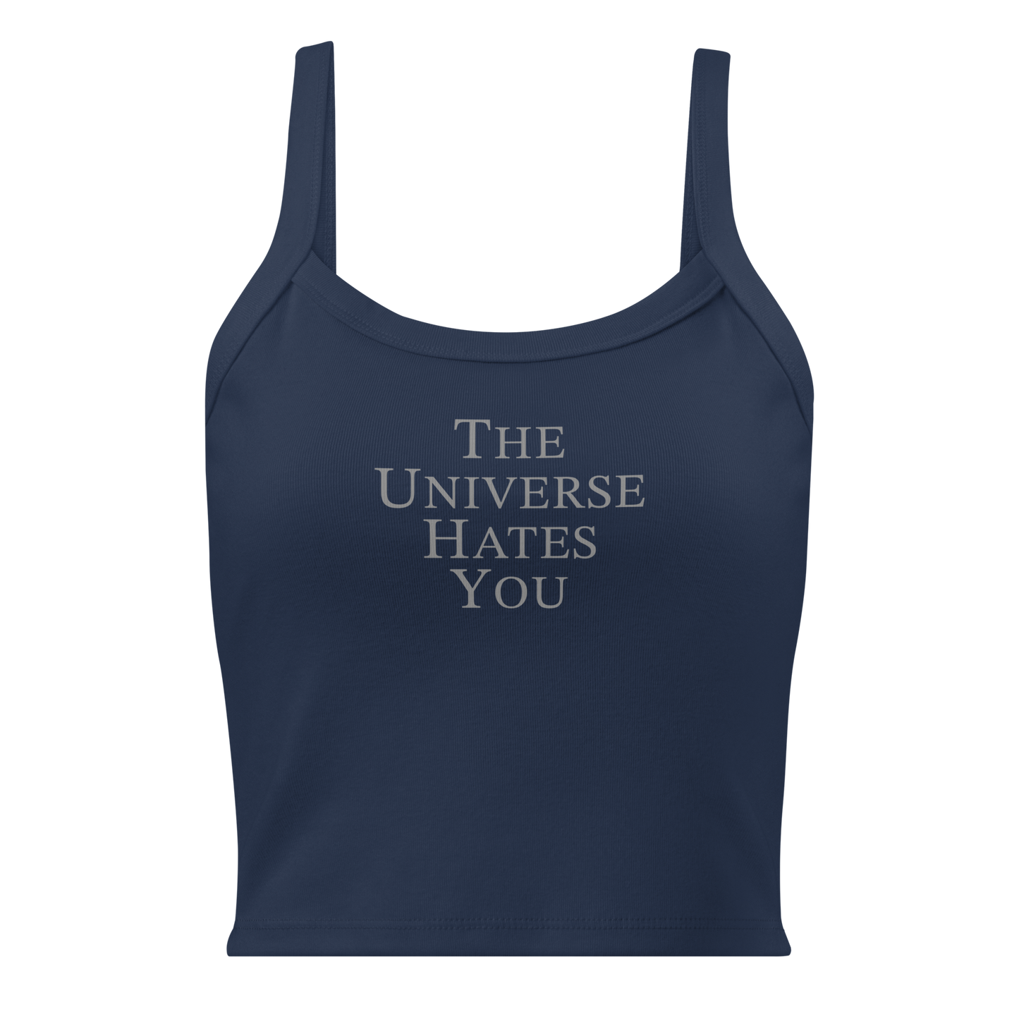 "The Universe Hates You" printed on a solid navy blend women's micro-rib tanktop laying on a flat surface