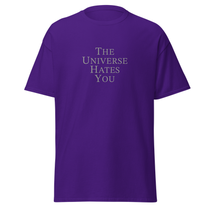 "The Universe Hates You" printed on a purple on an invisible body