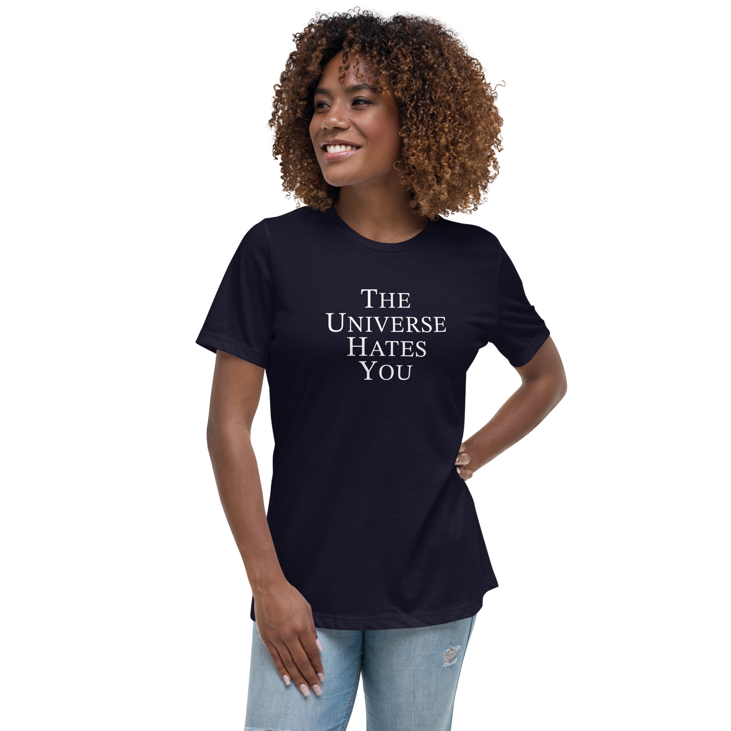 "The Universe Hates You" printed on a navy women's relaxed t-shirt worn by a female