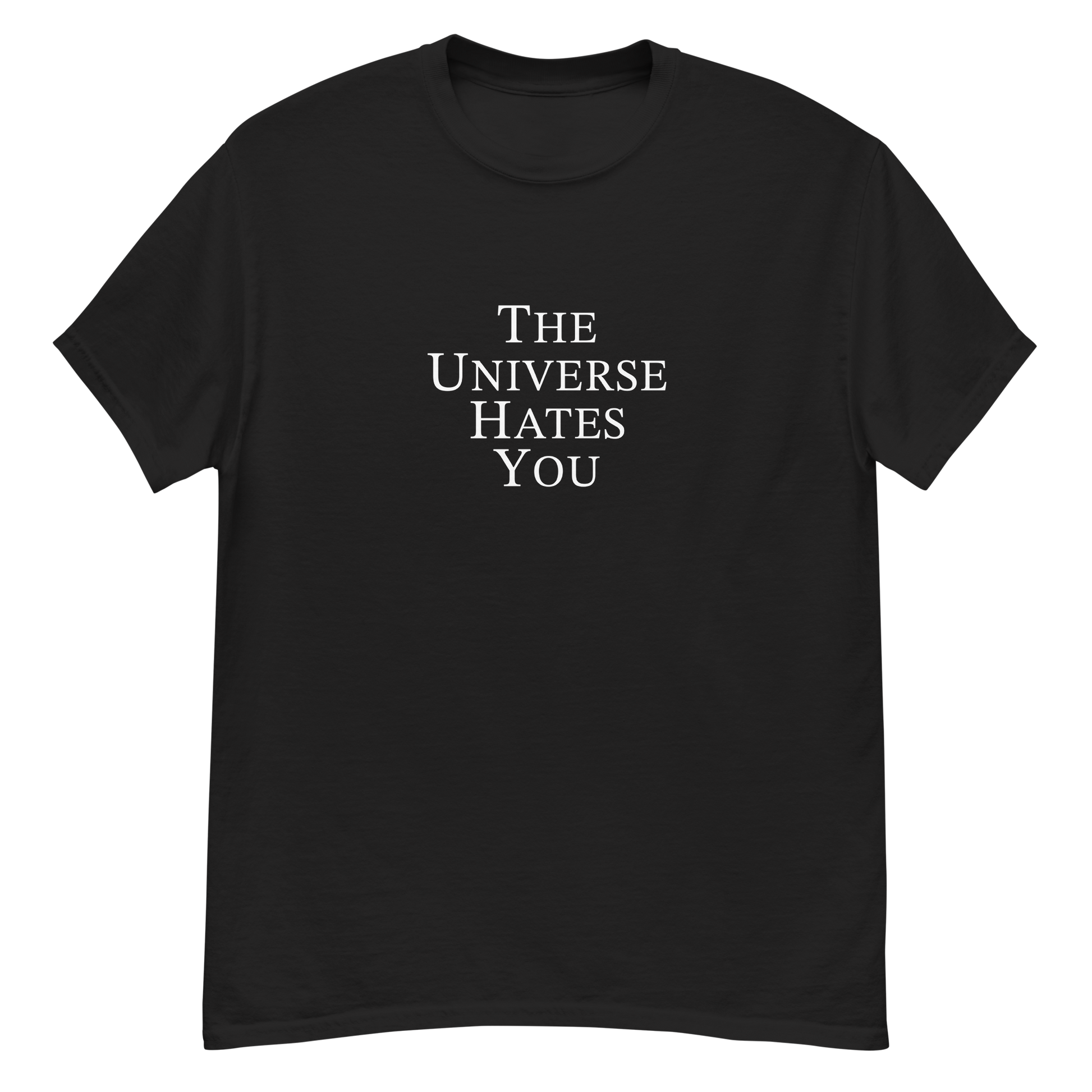 "The Universe Hates You" printed on a black unisex classic tee laying on a flat surface