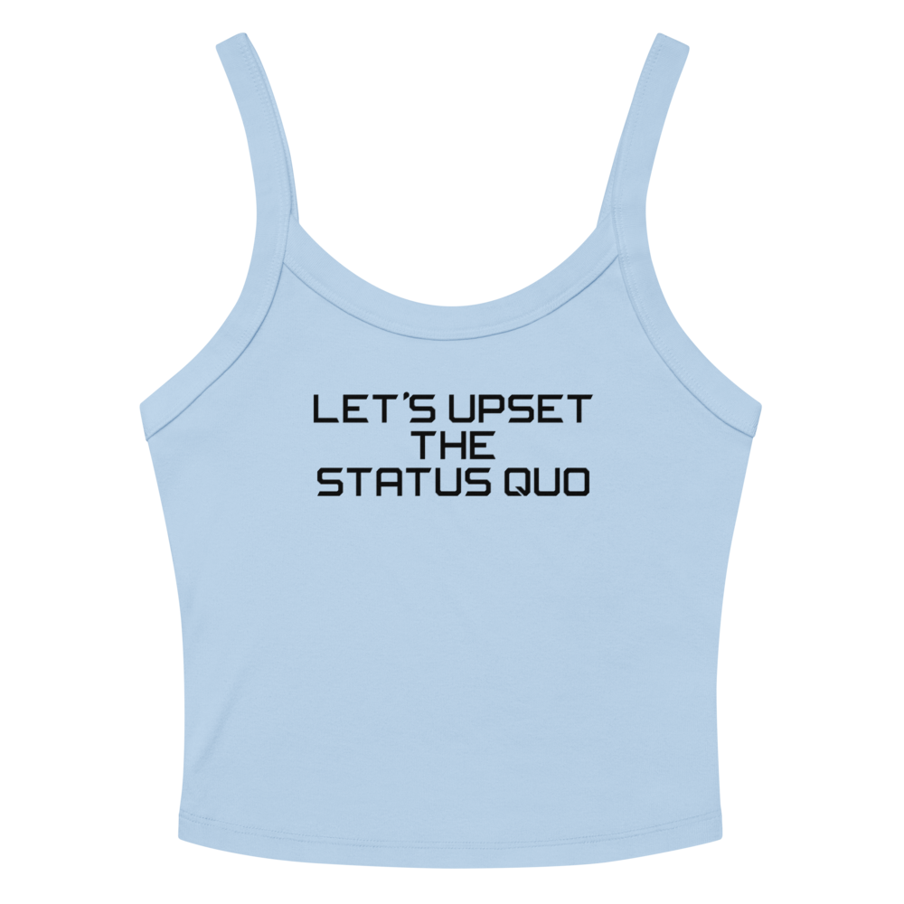 "Let's upset the status quo!" printed on a solid baby blue blend women's micro-rib tanktop laying on a flat surface amongst sunglasses and shorts
