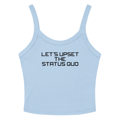 "Let's upset the status quo!" printed on a solid baby blue blend women's micro-rib tanktop laying on a flat surface amongst sunglasses and shorts
