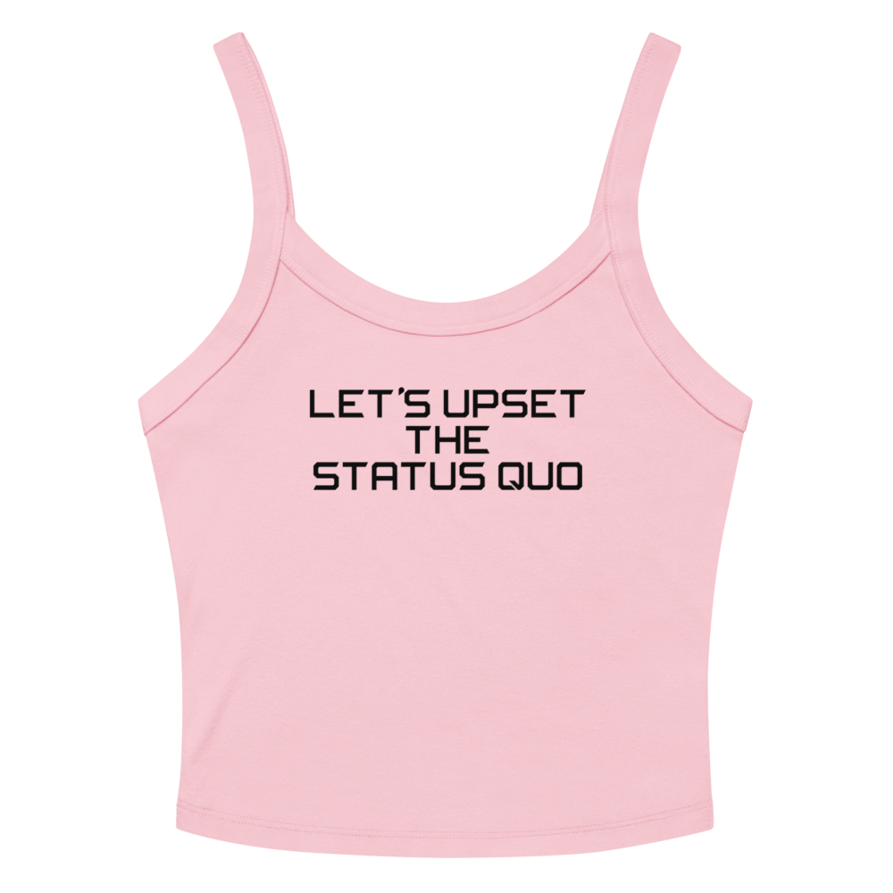 "Let's upset the status quo!" printed on a solid pink blend women's micro-rib tanktop laying on a flat surface amongst sunglasses and shorts