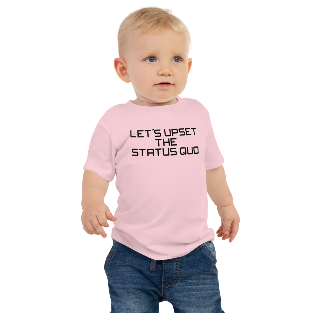 "Let's upset the status quo!" printed on a pink baby jersey short sleeve tee worn by a male