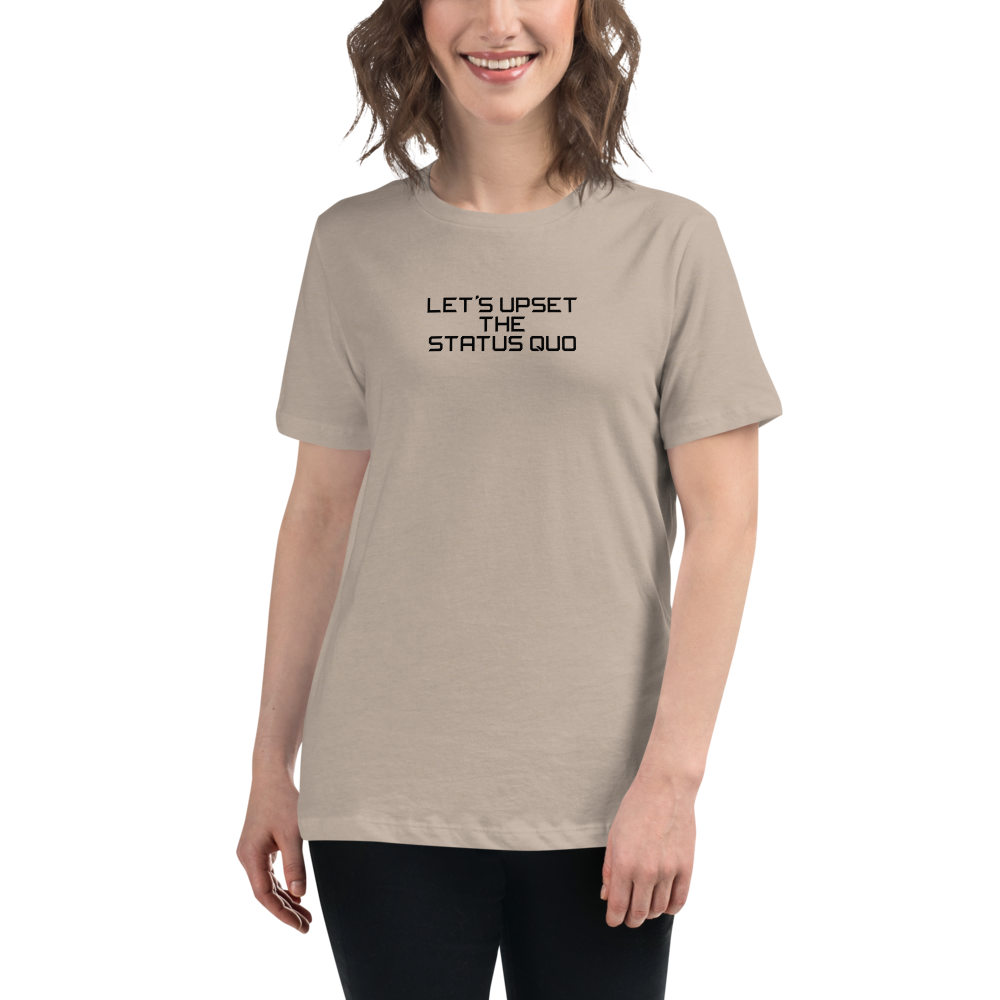 "Let's upset the status quo!" printed on a heather stone women's relaxed t-shirt worn by a female