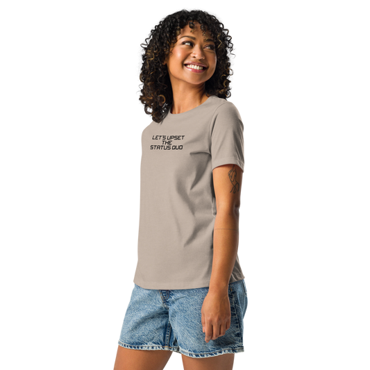 "Let's upset the status quo!" printed on a heather stone women's relaxed t-shirt worn by a female