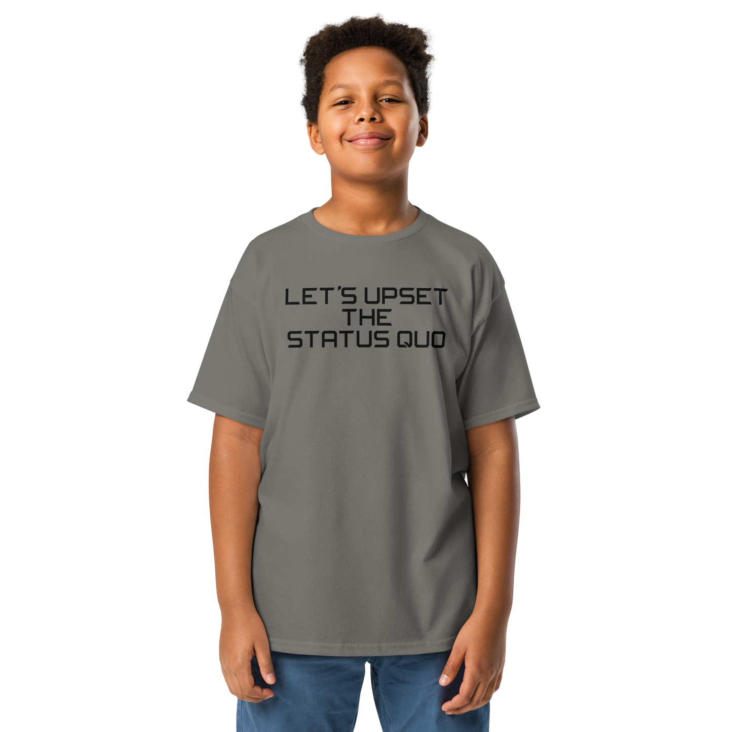 "Let's upset the status quo!" printed on a charcoal youth classic tee worn by a male