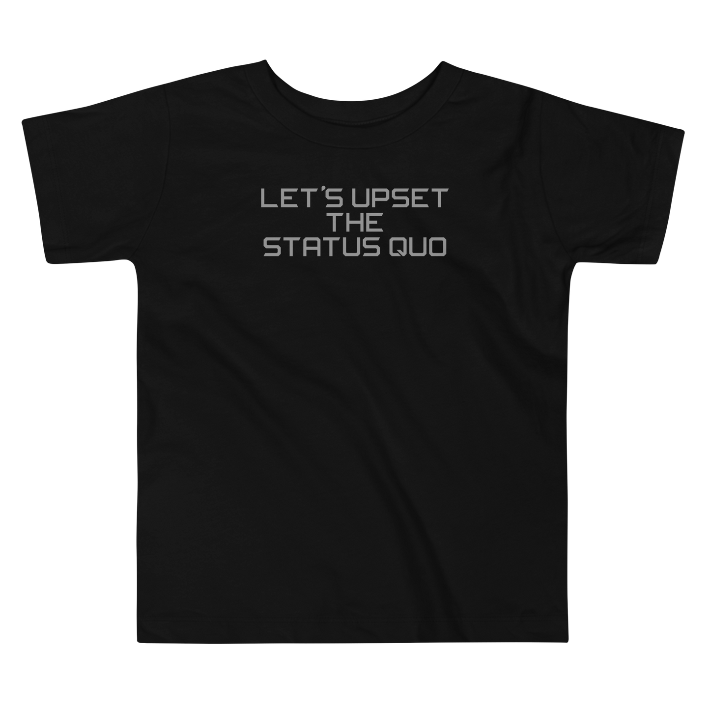 "Let's upset the status quo!" printed on a black toddler short sleeve tee laying on a flat surface