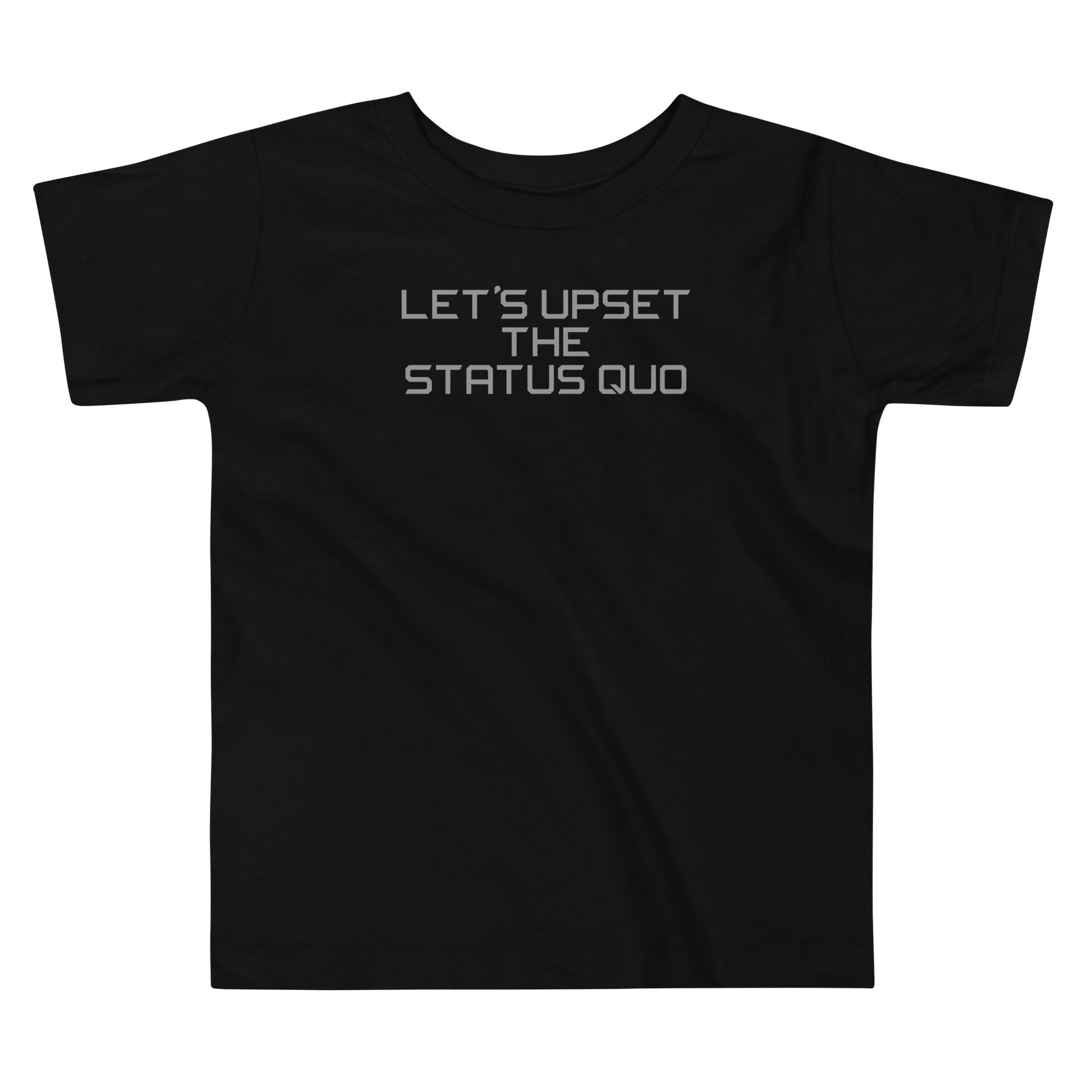 "Let's upset the status quo!" printed on a black toddler short sleeve tee laying on a flat surface