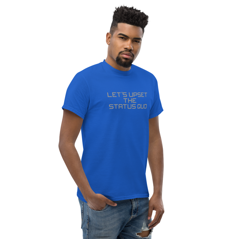 "Let's upset the status quo!" printed on a royal unisex classic tee worn by a male