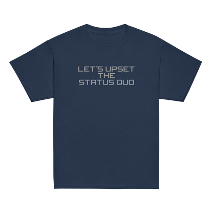 "Let's upset the status quo!" printed on a navy youth classic tee laying on a flat surface