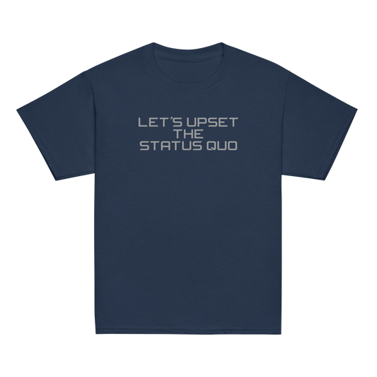 "Let's upset the status quo!" printed on a navy youth classic tee laying on a flat surface