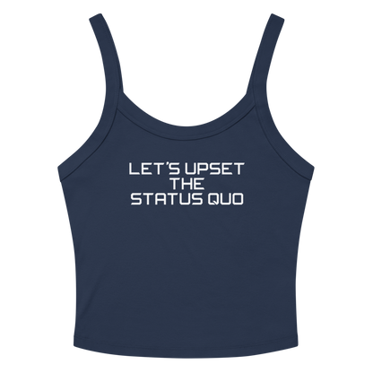 "Let's upset the status quo!" printed on a solid navy blend women's micro-rib tanktop laying on a flat surface amongst sunglasses and shorts