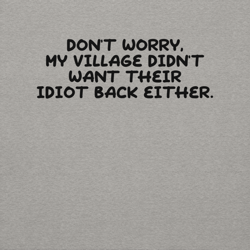"Don't worry, my village didn’t want their idiot back either." printed on a carbon grey background