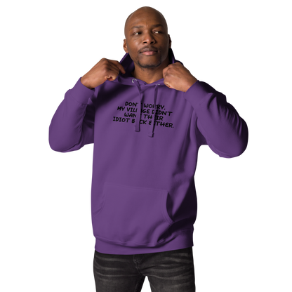 "Don't worry, my village didn’t want their idiot back either." printed on a purple unisex hoodie worn by a male