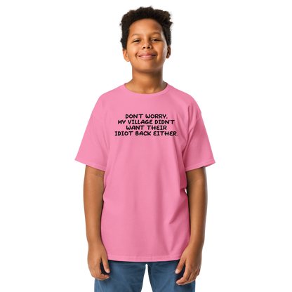 "Don't worry, my village didn’t want their idiot back either." printed on a azalea youth classic tee worn by a male
