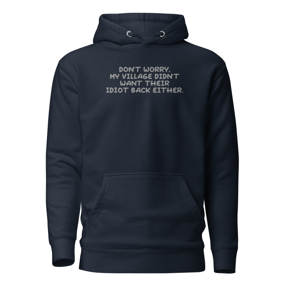 "Don't worry, my village didn’t want their idiot back either." printed on a navy blazer on an invisible / simulated body