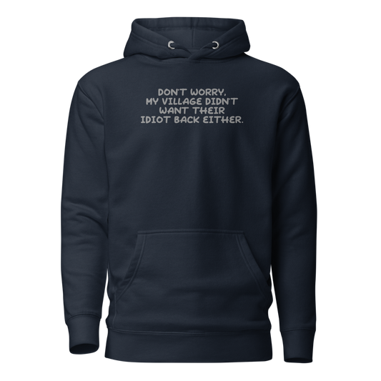 "Don't worry, my village didn’t want their idiot back either." printed on a navy blazer on an invisible / simulated body