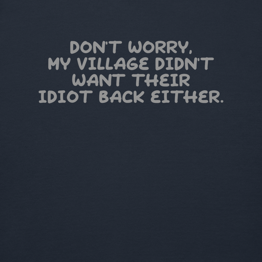 "Don't worry, my village didn’t want their idiot back either." printed on a navy blazer background