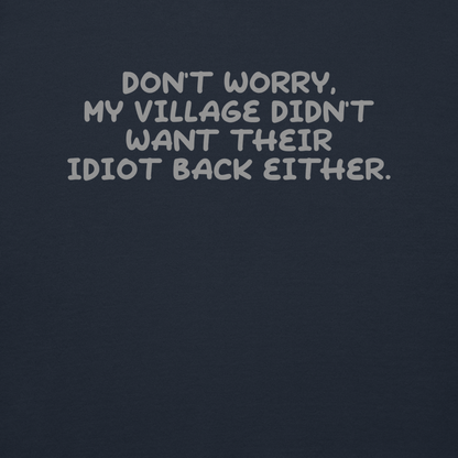 "Don't worry, my village didn’t want their idiot back either." printed on a navy blazer background