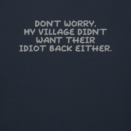 "Don't worry, my village didn’t want their idiot back either." printed on a navy blazer background