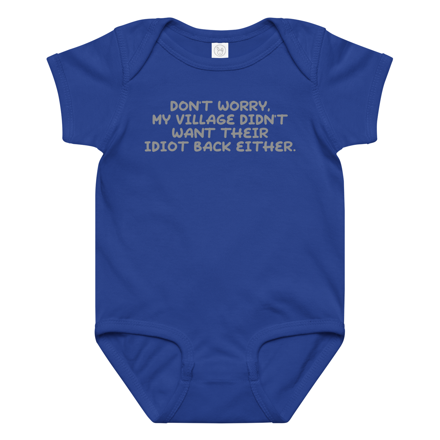 "Don't worry, my village didn’t want their idiot back either." printed on a royal baby jersey bodysuit laying on a flat surface amongst other clothes