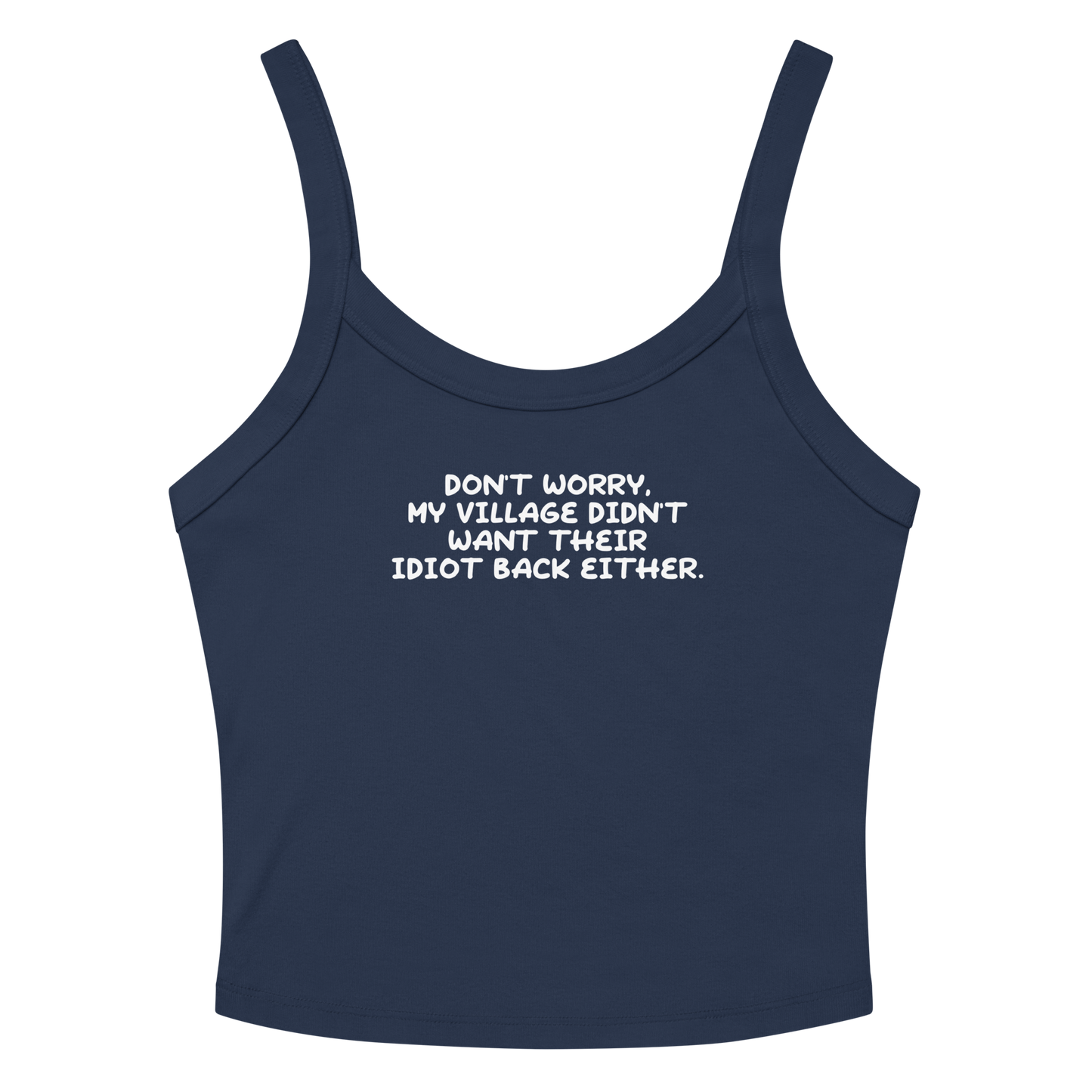 "Don't worry, my village didn’t want their idiot back either." printed on a solid navy blend women's micro-rib tanktop laying on a flat surface amongst sunglasses and shorts