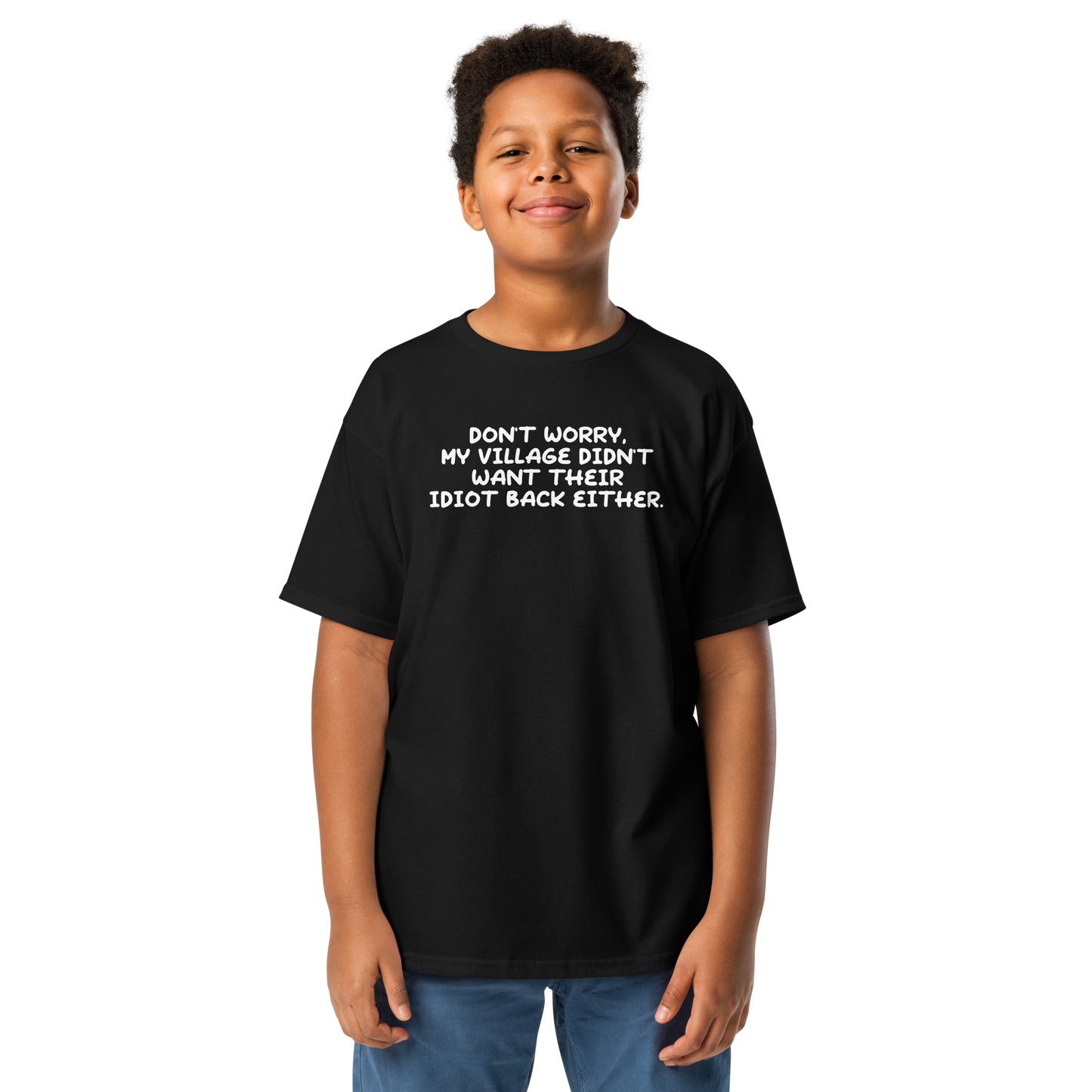 "Don't worry, my village didn’t want their idiot back either." printed on a black youth classic tee worn by a male
