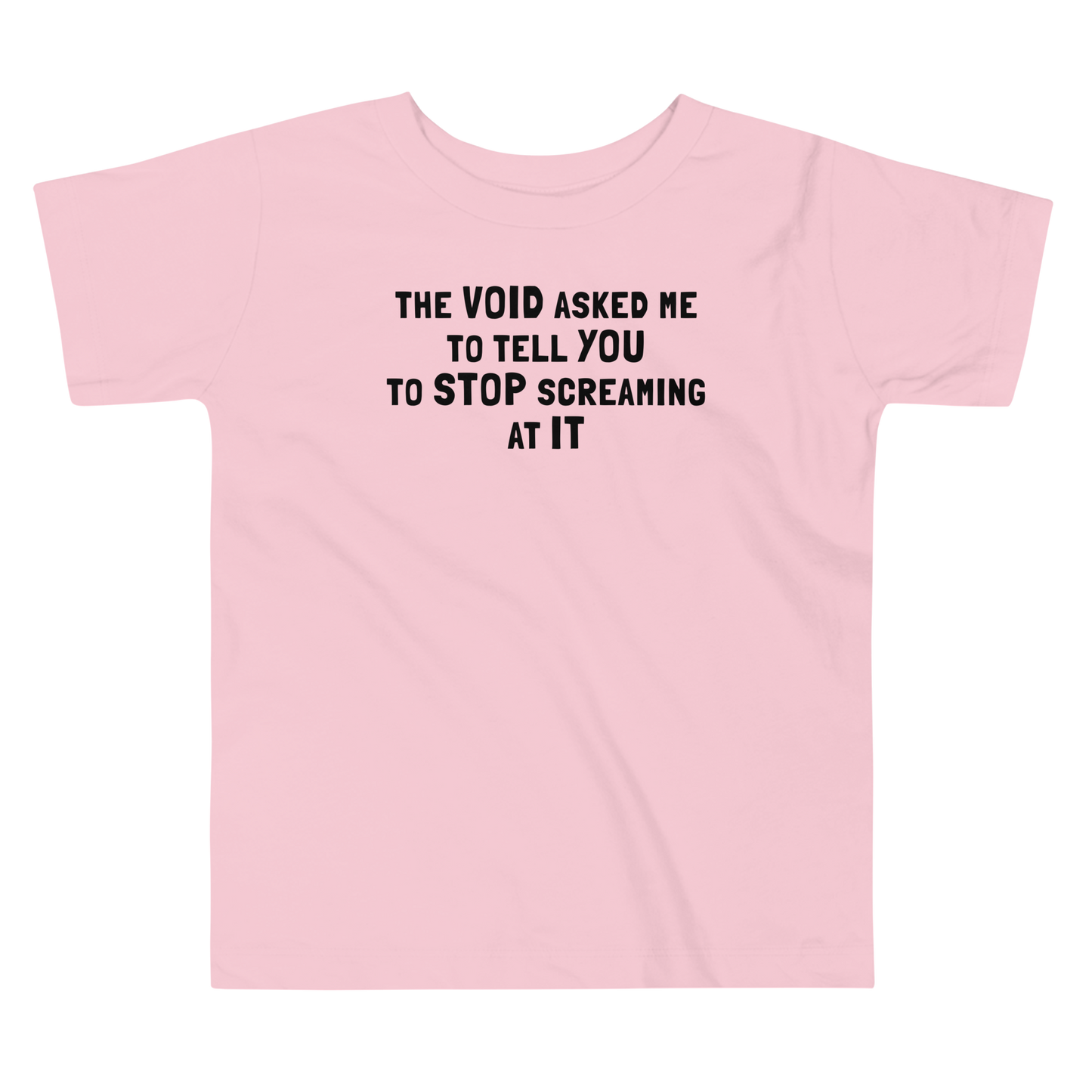 "The Void asked me to tell you to stop screaming at it" printed on a pink toddler short sleeve tee laying on a flat surface