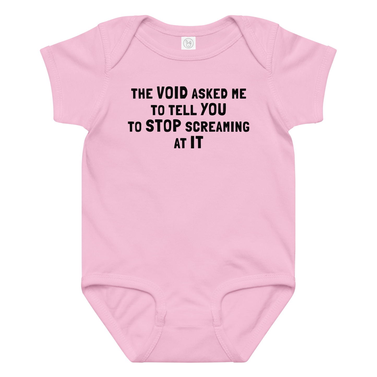 "The Void asked me to tell you to stop screaming at it" printed on a pink baby jersey bodysuit laying on a flat surface amongst other clothes