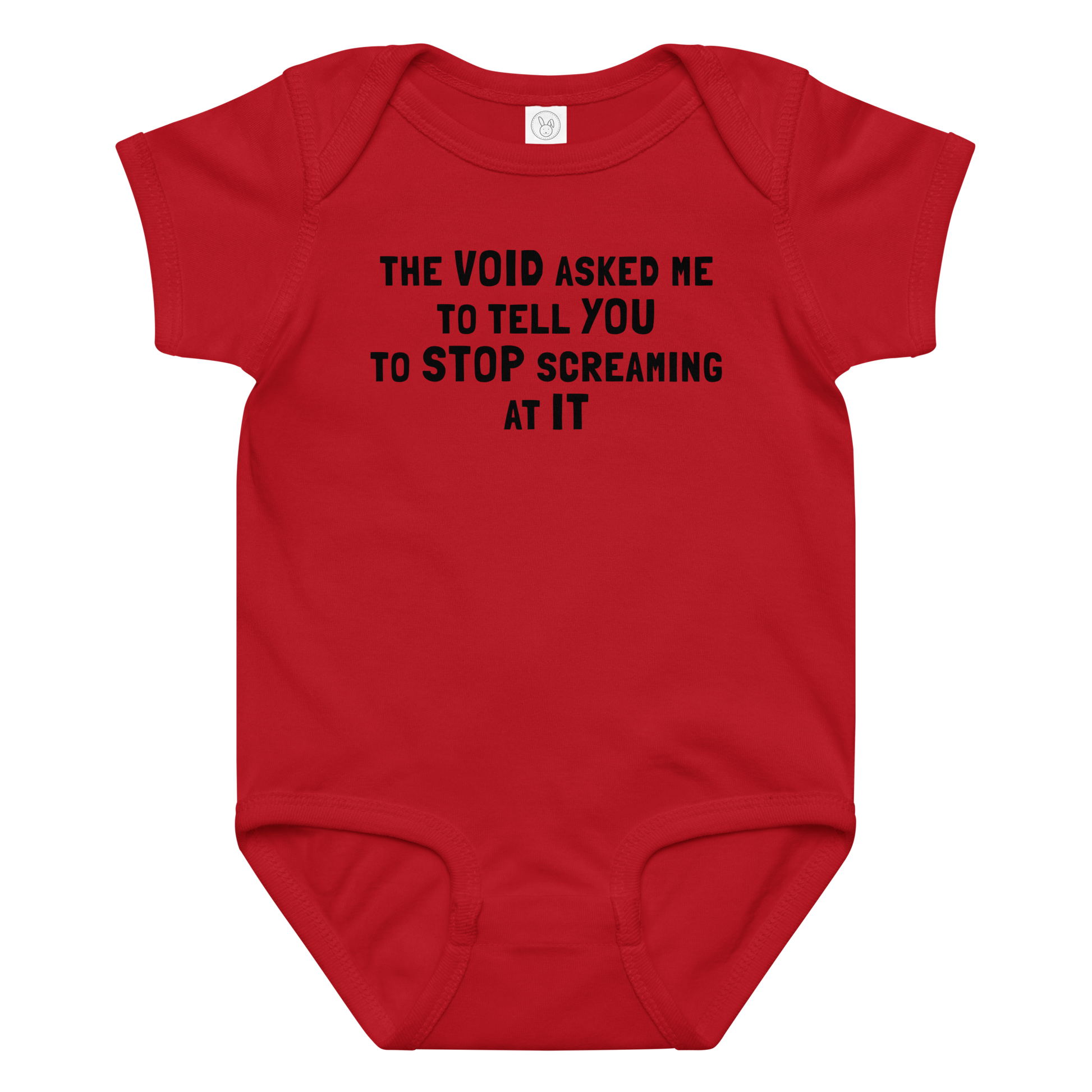 "The Void asked me to tell you to stop screaming at it" printed on a red baby jersey bodysuit laying on a flat surface amongst other clothes