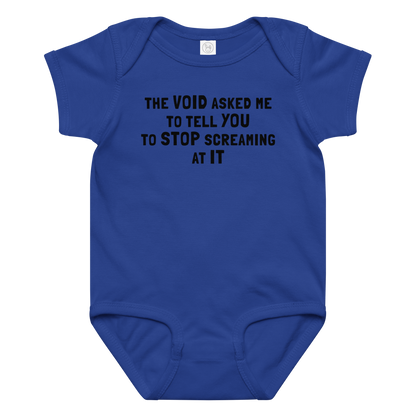 "The Void asked me to tell you to stop screaming at it" printed on a royal baby jersey bodysuit laying on a flat surface amongst other clothes