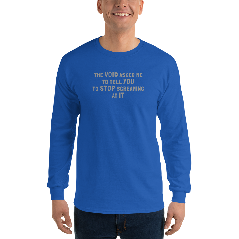 "The Void asked me to tell you to stop screaming at it" printed on a royal men's long sleeve shirt worn by a male