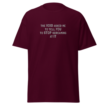 "The Void asked me to tell you to stop screaming at it" printed on a maroon on an invisible body