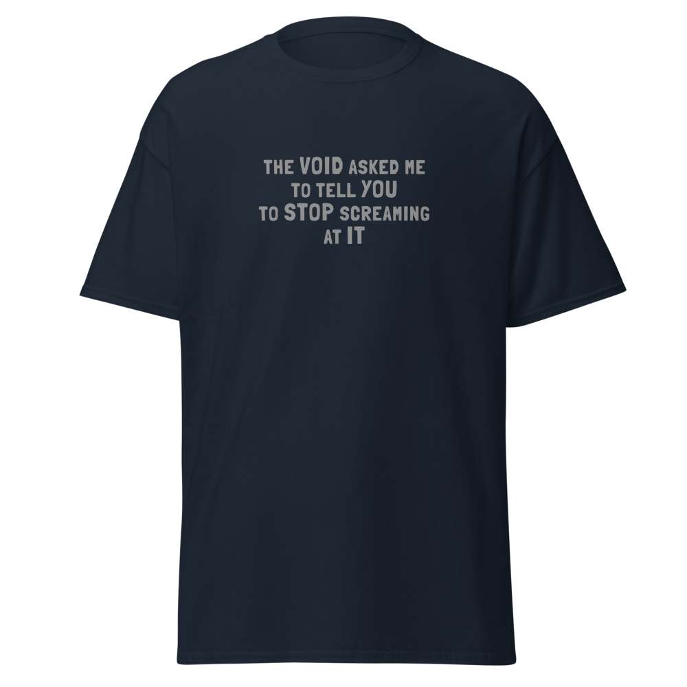 "The Void asked me to tell you to stop screaming at it" printed on a navy on an invisible body