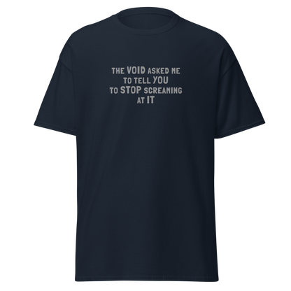 "The Void asked me to tell you to stop screaming at it" printed on a navy on an invisible body