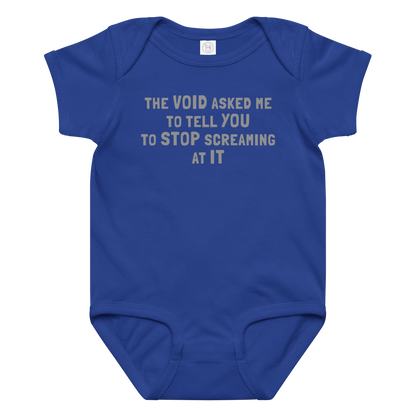 "The Void asked me to tell you to stop screaming at it" printed on a royal baby jersey bodysuit laying on a flat surface amongst other clothes