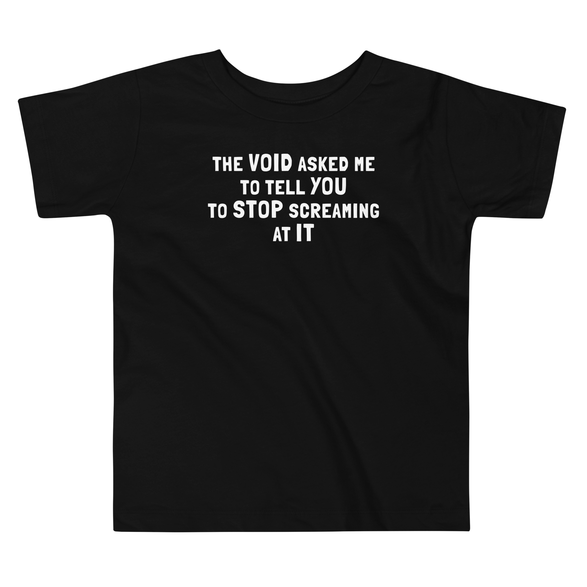 "The Void asked me to tell you to stop screaming at it" printed on a black toddler short sleeve tee laying on a flat surface