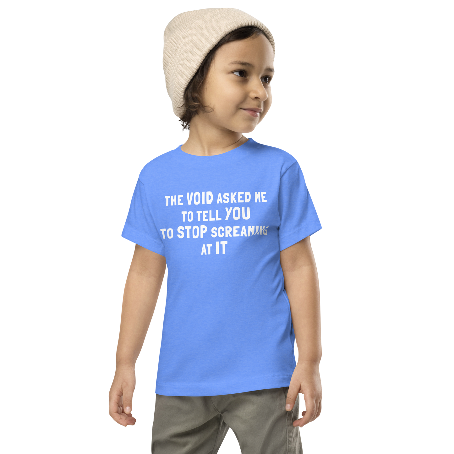"The Void asked me to tell you to stop screaming at it" printed on a heather columbia blue toddler short sleeve tee worn by a male wearing a cap