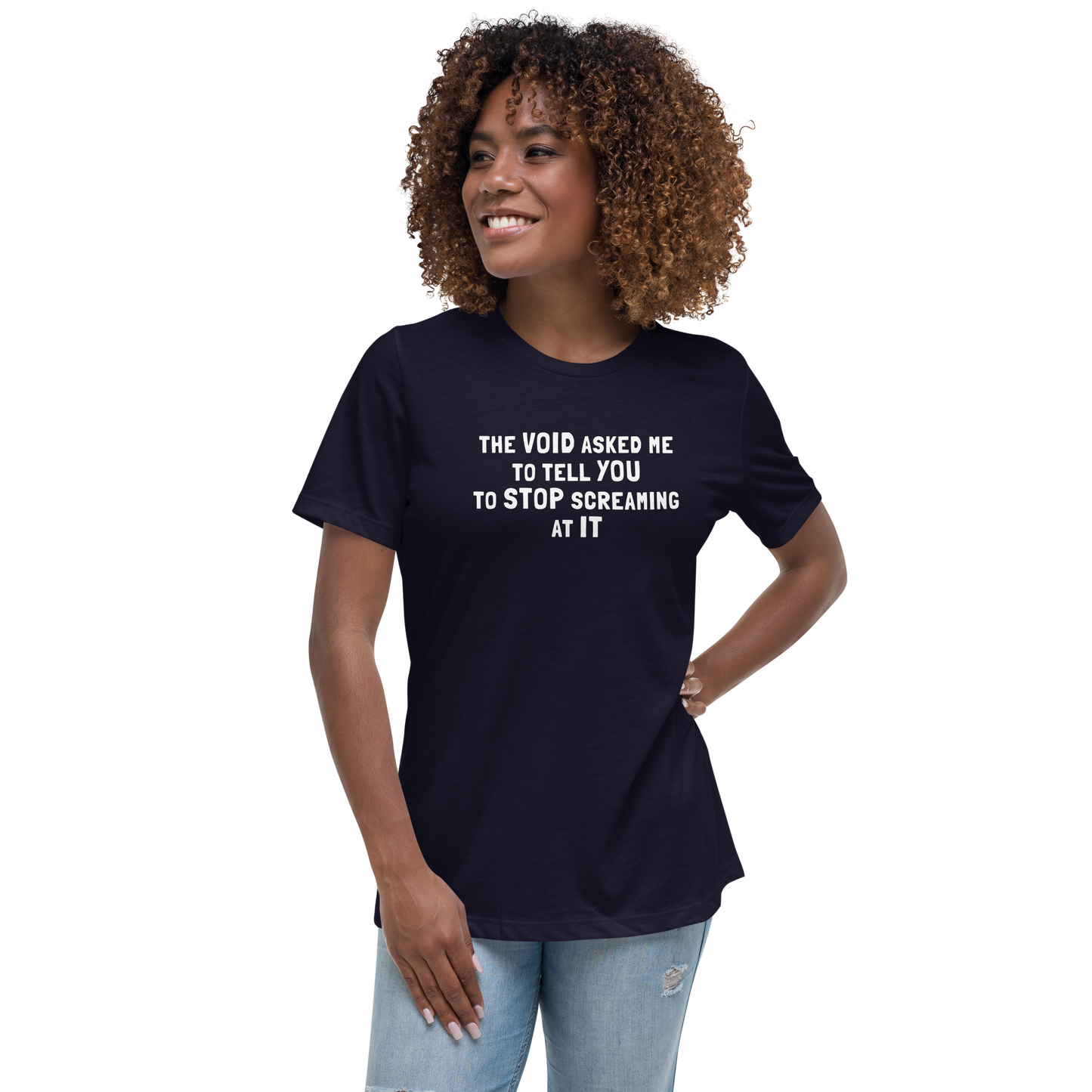 "The Void asked me to tell you to stop screaming at it" printed on a navy women's relaxed t-shirt worn by a female