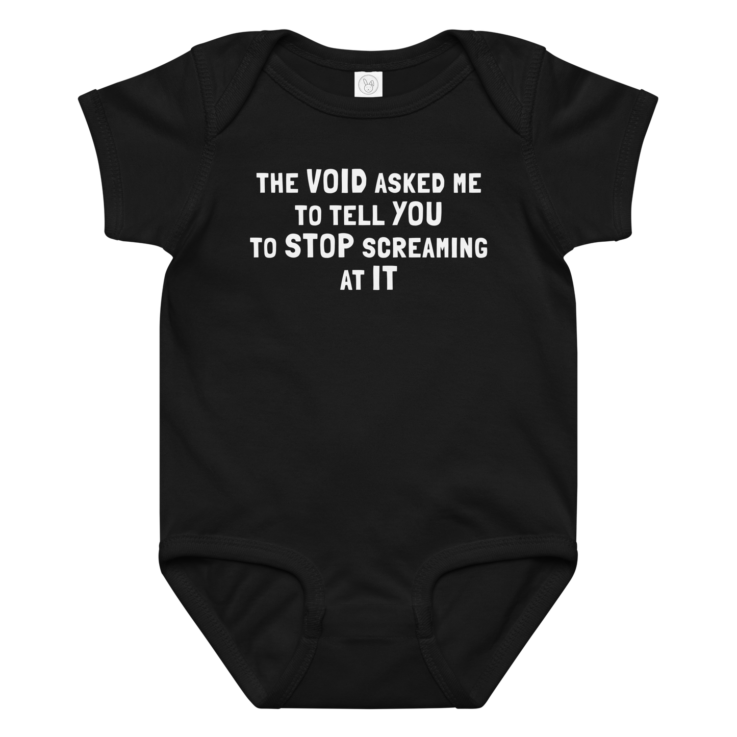 "The Void asked me to tell you to stop screaming at it" printed on a black baby jersey bodysuit laying on a flat surface amongst other clothes