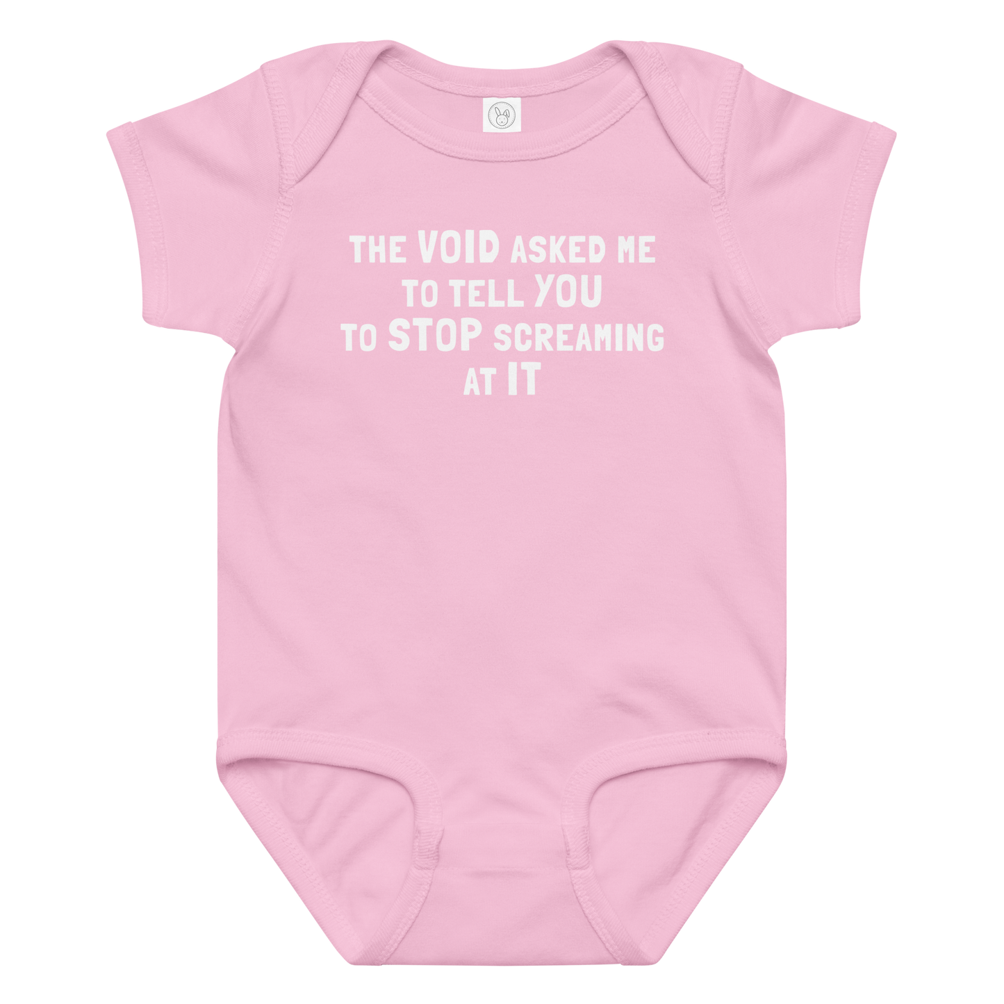 "The Void asked me to tell you to stop screaming at it" printed on a pink baby jersey bodysuit laying on a flat surface amongst other clothes