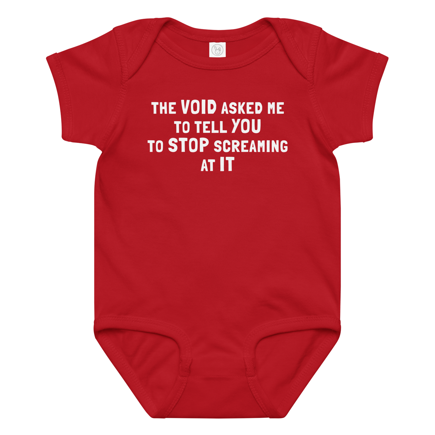 "The Void asked me to tell you to stop screaming at it" printed on a red baby jersey bodysuit laying on a flat surface amongst other clothes