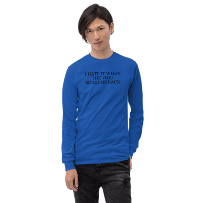 "I hate it when the void screams back" printed on a royal men's long sleeve shirt worn by a male
