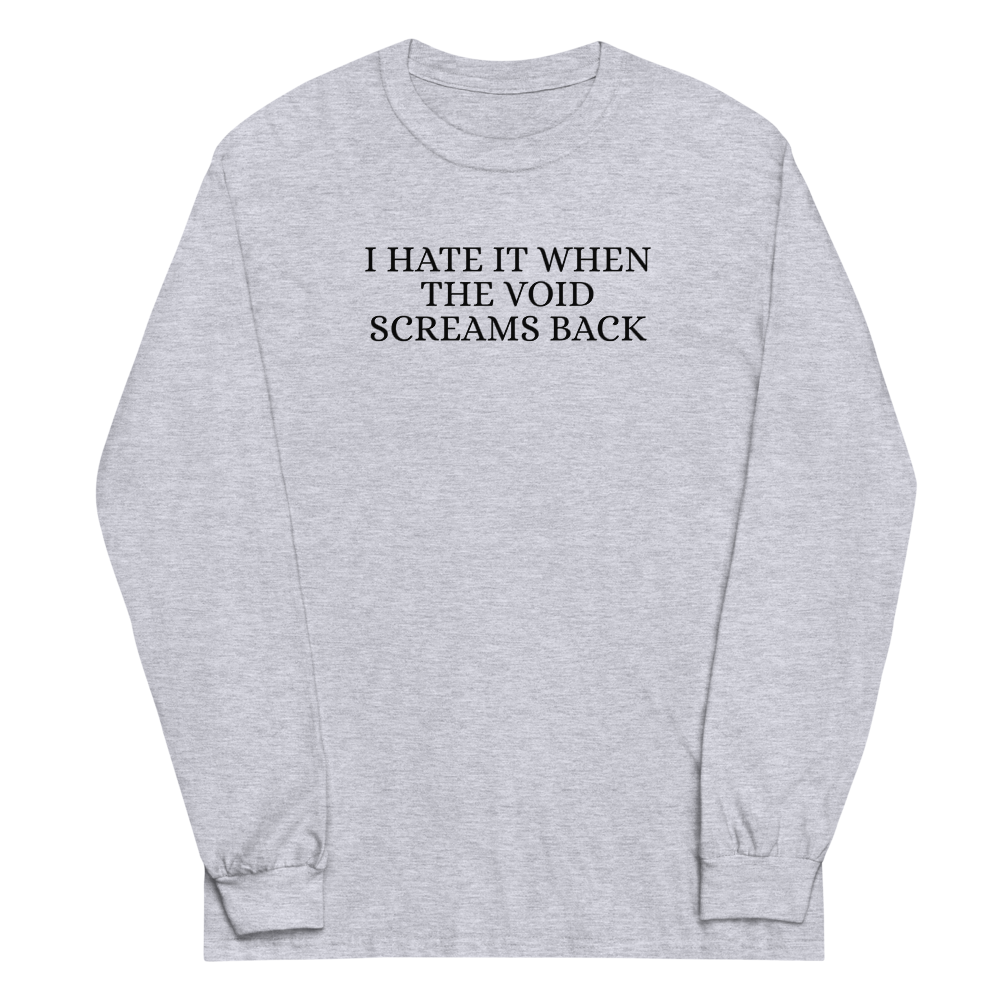"I hate it when the void screams back" printed on a sport grey men's long sleeve shirt laying on a flat surface