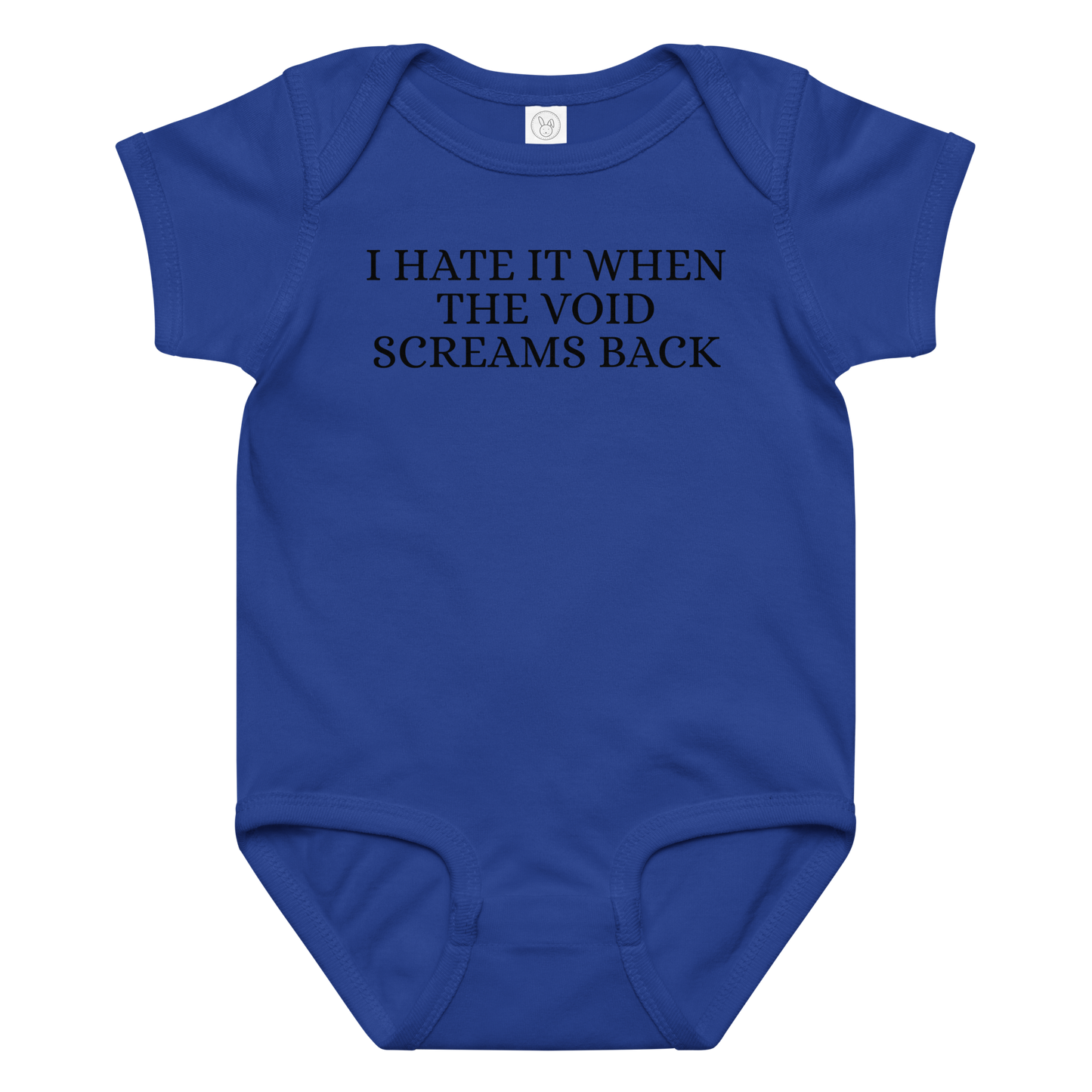 "I hate it when the void screams back" printed on a royal baby jersey bodysuit laying on a flat surface amongst other clothes