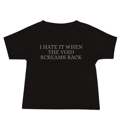 "I hate it when the void screams back" printed on a black baby jersey short sleeve tee laying on a flat surface